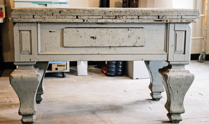 An antique, more than a century old marble-topped work table, well-used by pressmen and newspaperwomen and men in the True Dakotan since the building was erected in 1915.