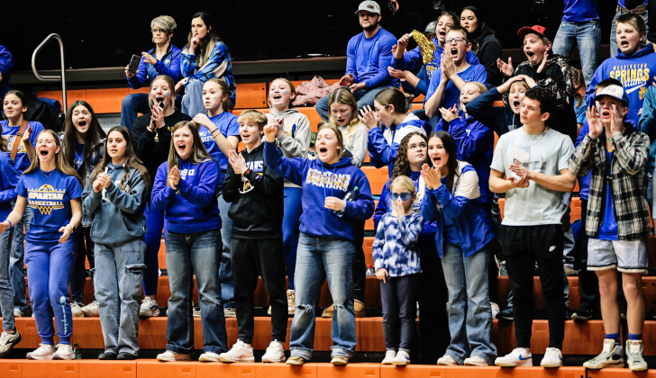 Spartans fans in the student section showed their spirit at the Huron Arena.         