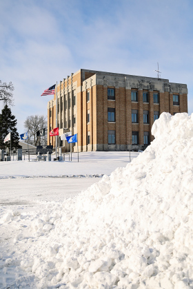 Remnants from the early-week storm are shown north of the Jerauld County Courthouse. 