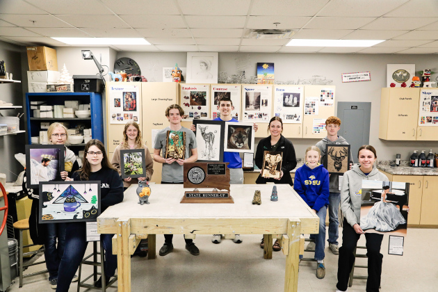 Shown left to right with their award-winning art are: Nichelle Kruse, Darcy Ormsmith, Alexis Roesler, Wynand Bothma, Brock Krueger, Haeleigh Mulder, Lily Roesler, JD Thompson and Ashlyn Weber.