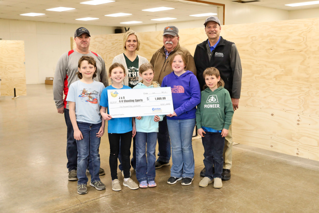 Central Electric Cooperative presented a $1,000 Operation Round-Up grant to J&B 4-H Shooting Sports on April 10. Shown left to right, back row: Aaron Roesler, J&B 4-H Shooting Sports Treasurer; Amber Kolousek, Operation Round Up Board Member; Mark Reindl, Central Electric Board Member; Ken Schlimgen, Central Electric Cooperative General Manager. Front row, left to right: J&B Shooting Sports 4-Hers Myles Tanke, Torree Olinger, Crawleigh Reiner, Quinn Everson and Kershaw Reiner.    