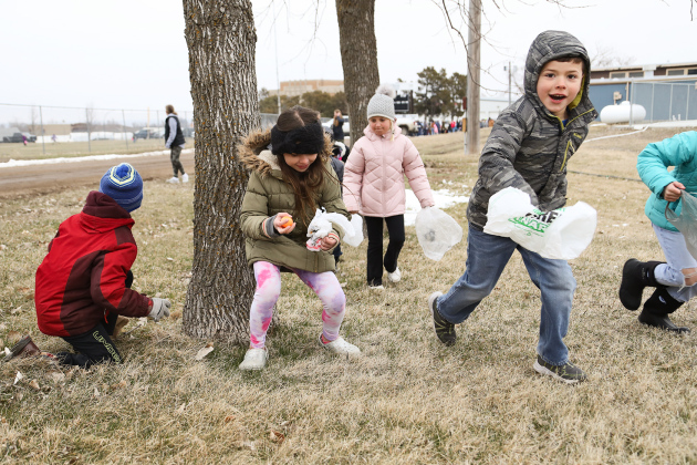 Despite the chill, visiting and local kids and their families enjoyed time outdoors together as they canvassed the city parks on the lookout for brightly colored, sought-after, candy and prize- filled eggs.
