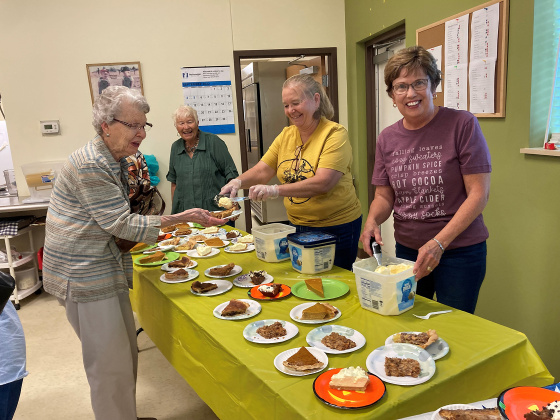 Senior/Community Center volunteers served a variety of pies and ice cream after the Homecoming parade. Shown left to right, Elaine Roetman, Judy Winegar, Rosie Jensen, and Ann Olson. DELIA ATKINSON / TRUE DAKOTAN. 